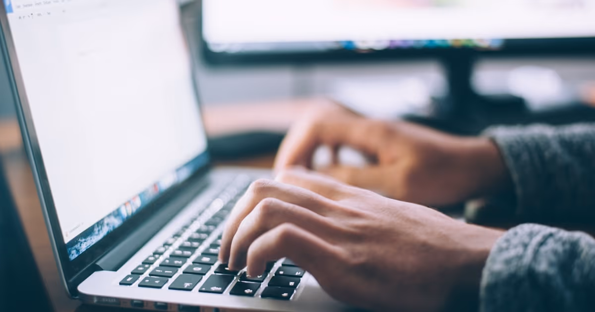 Researcher using Perplexity AI on laptop for cited online research — complete 2026 guide